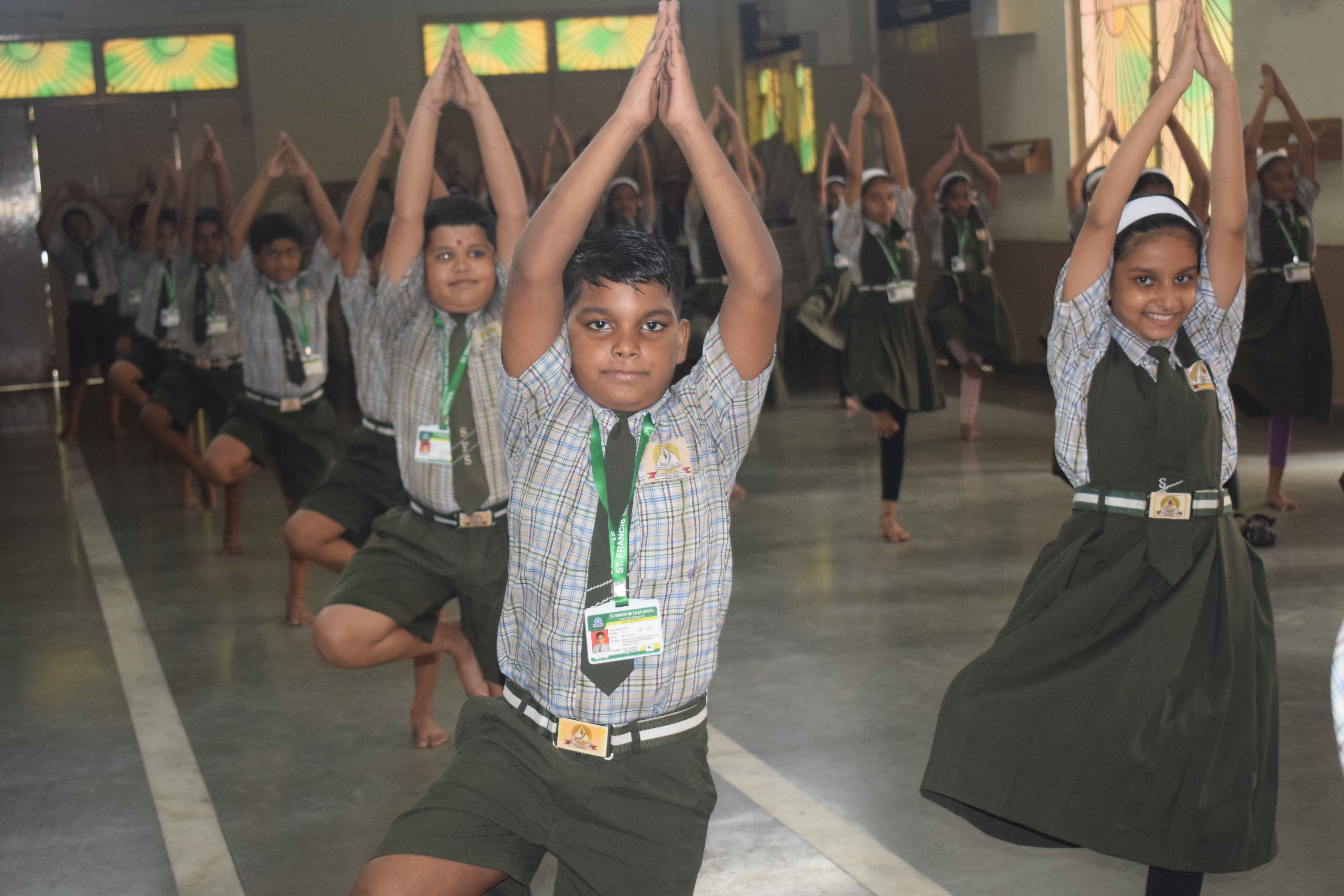 Teacher guiding yoga session